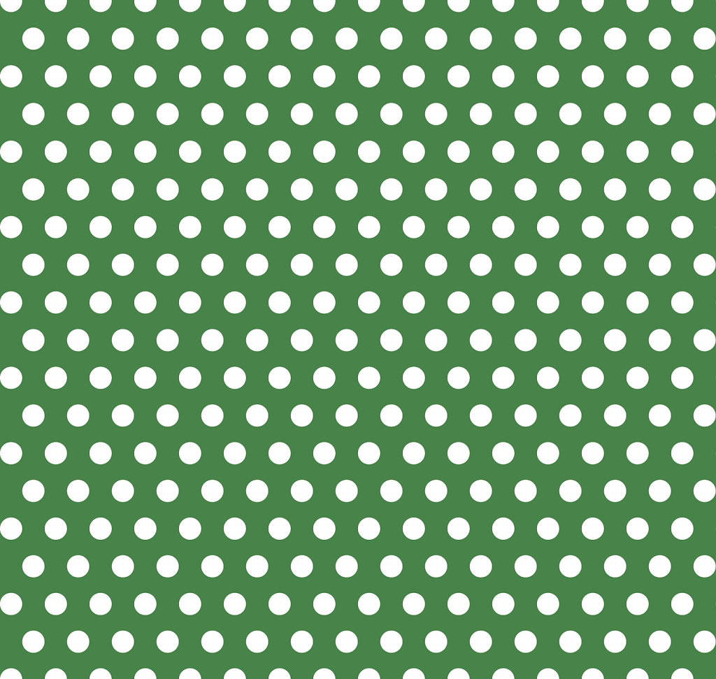 Emerald green background with white polka dots