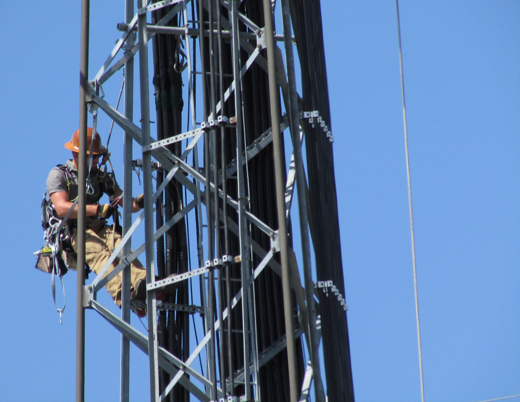 cell phone tower repair worker