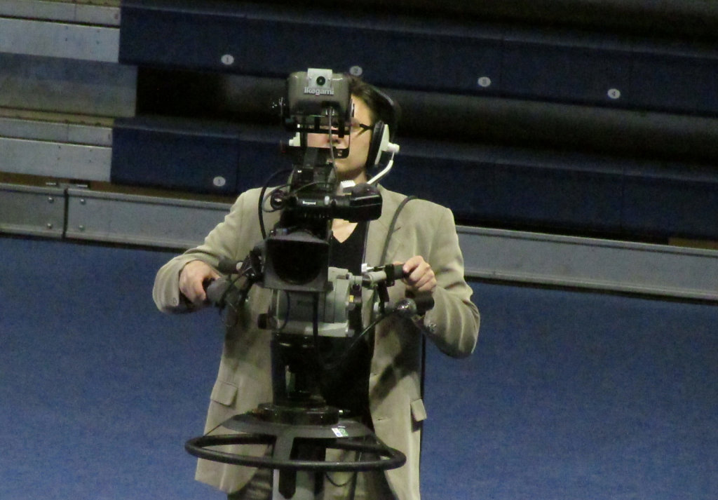 Camera man and camera