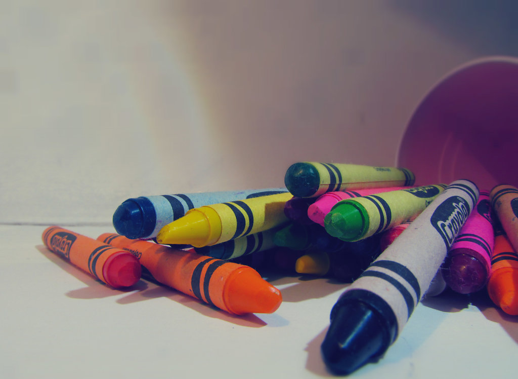 crayons on top of table